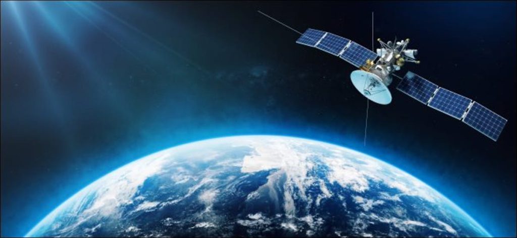 Impresión artística de un satélite en órbita alrededor de la Tierra.