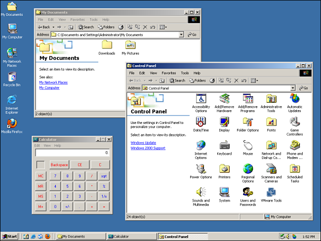 "Mis documentos," "Panel de control," y "Calculadora" abrir en un escritorio de Windows 2000.