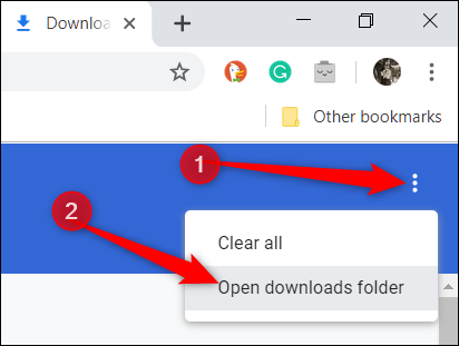 Abra la carpeta de descargas haciendo clic en los tres puntos y luego haciendo clic en "Abra la carpeta de descargas."