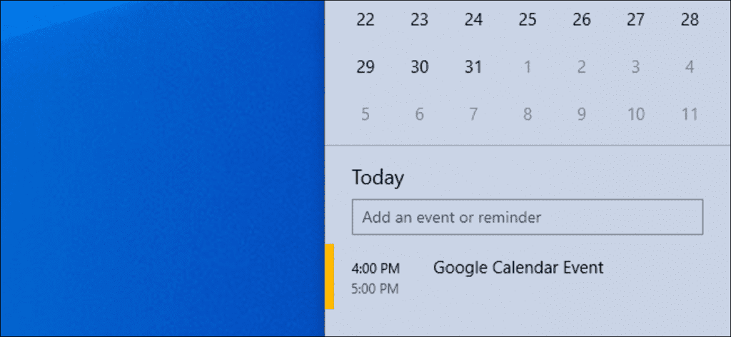 Un evento de Google Calendar en la ventana emergente del calendario de la barra de tareas de Windows 10.