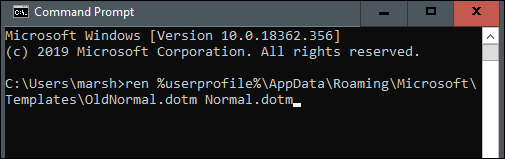 los "Ren% userprofile% AppData  Roaming  Microsoft  Templates  OldNormal.dotm Normal.dotm" orden en el "Símbolo del sistema" ventana.