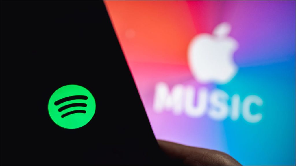 Logos de Spotify y Apple Music uno al lado del otro