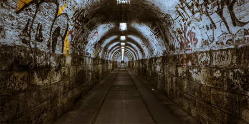 Tunnel with graffiti and lights