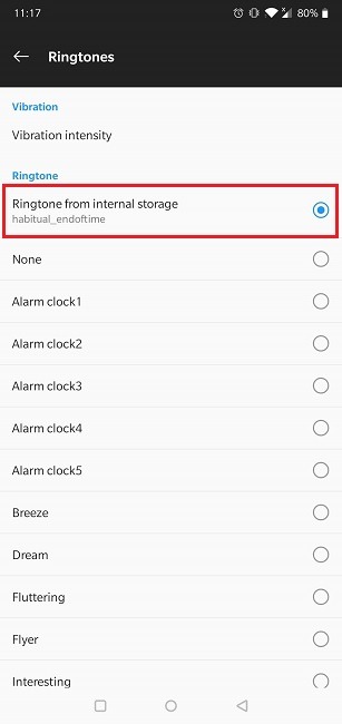 Cómo activar el tono de llamada personalizado de la aplicación de reloj nativo de alarma de Spotify